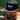 man in the water wearing shred h2o's mountain hat